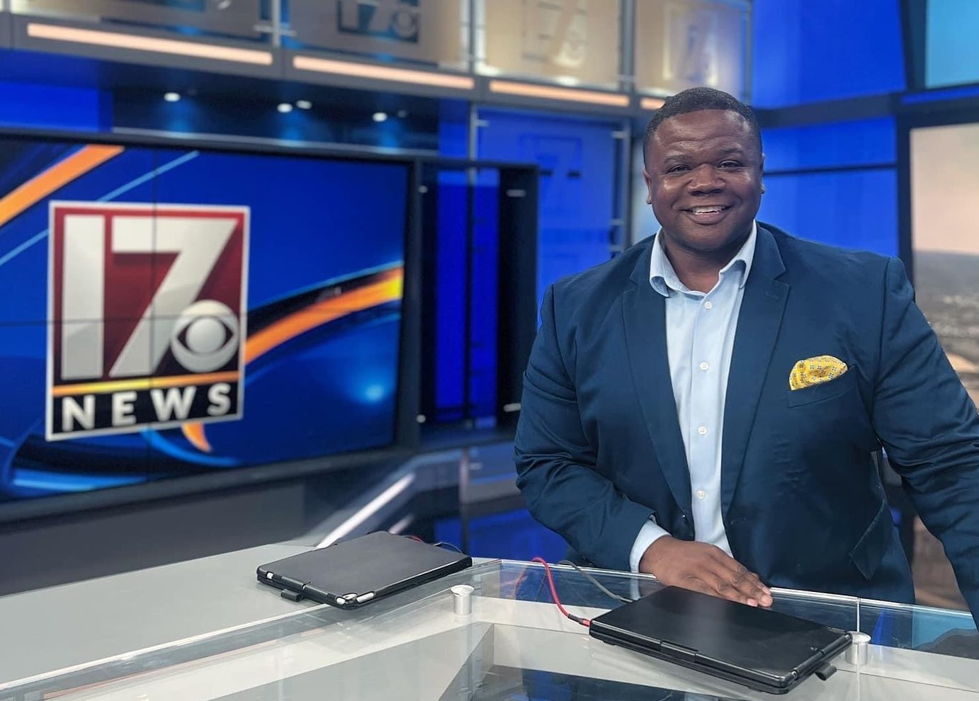 Mass Comm alum Greg Funderburg in a TV studio