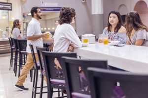 Students conversing at the dining hall