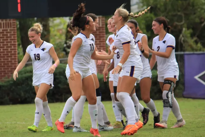 Women Soccer Team celebration after match score